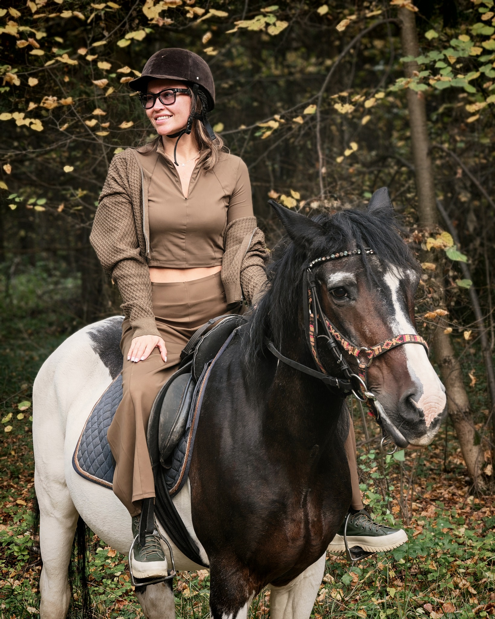 Horse riding in the autumn woods